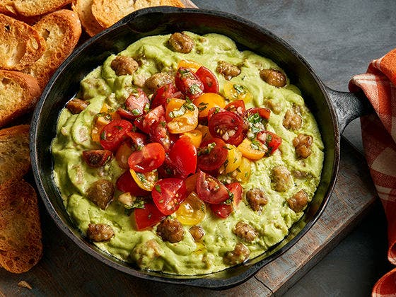 Sausage, pesto and tomotoes dip image