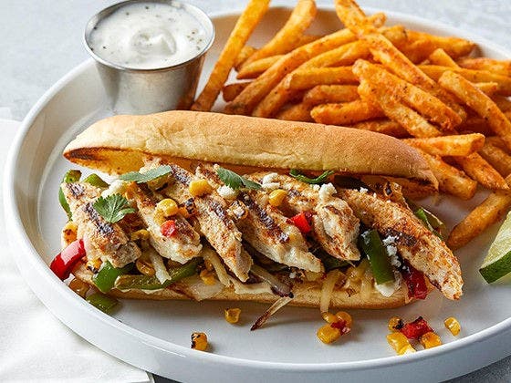 Fajita Chicken Cheesesteak Sandwich featuring Tyson Red Label® Fajita Seasoned Chicken Breast Strips