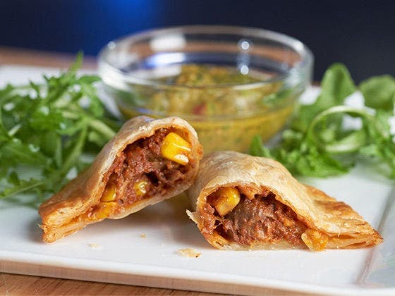 Breakfast Empanadas featuring Jimmy Dean® Fully Cooked Original Skinless Pork Sausage Links and Jimmy Dean® Fully Cooked Bacon Pieces ½”. 