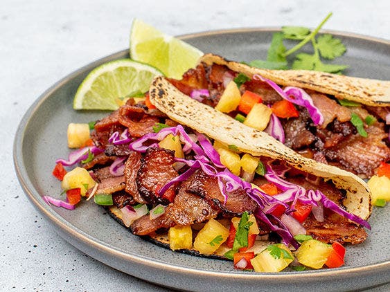 Image of Al Pastor Pork Belly Tacos.