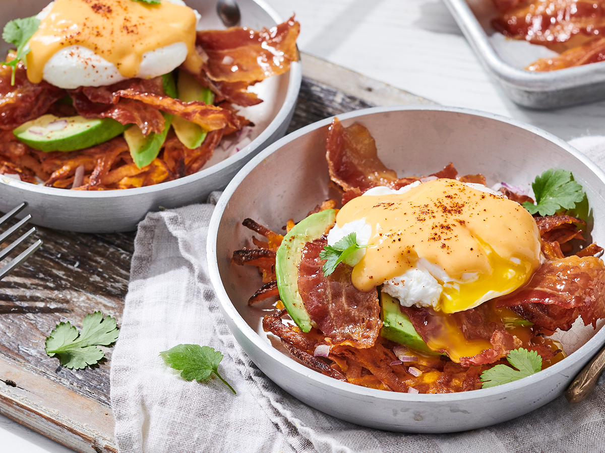 Smoky-Sweet Potato Eggs Benedict featuring Jimmy Dean® Fully Cooked Hickory Smoked Bacon Slices.
