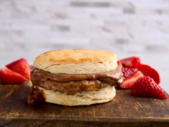 Chipotle Chocolate Sausage Biscuit With Strawberries on a Board