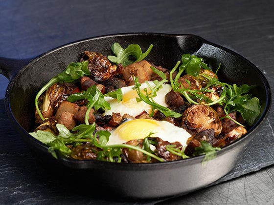 Roasted Brussel Sprouts and sausage in a skillet