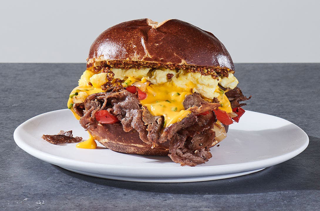 Philly biergarten steak and egg breakfast sandwich