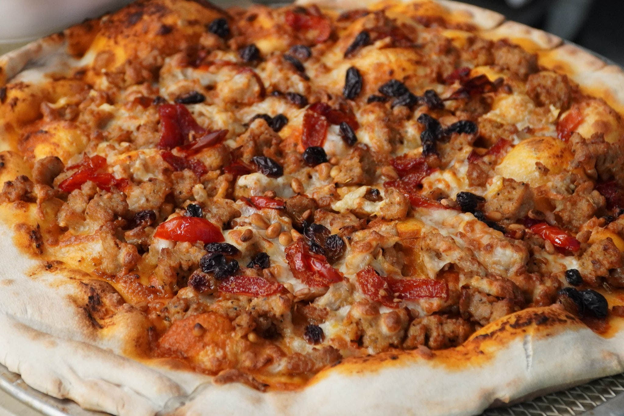 Spicy Sicilian pizza with sausage crumbles