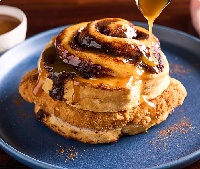 Crispy Chicken Cinnamon Roll Sandwich on a blue plate