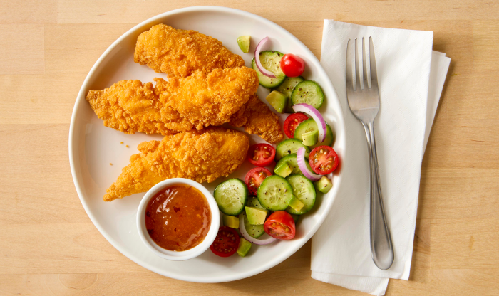 Gluten free chicken tenderloins with vegetables and sauce
