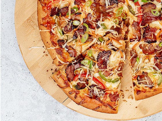 Image of Thai style pork belly pizza.