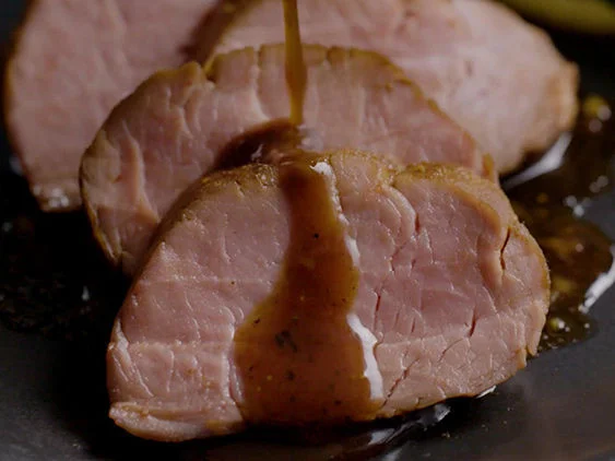 Pan Seared and Sliced Glazed Pork Tenderloin on a Plate