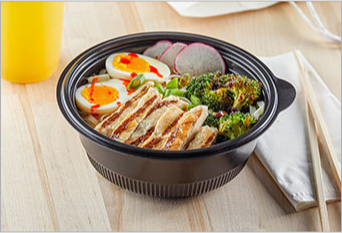Ramen soup bowl with broccoli and cut in half boiled eggs
