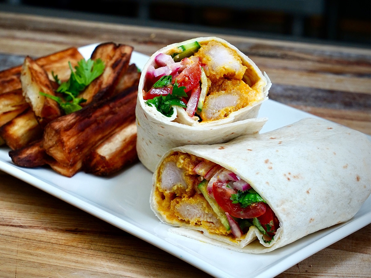 How to make a robust, handheld Aji Verde Chicken Wrap featuring Tyson Panko Breaded Chicken Bites.