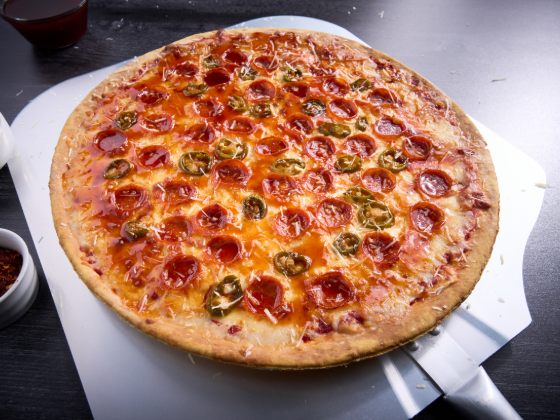 Pepperoni and jalapeño pizza